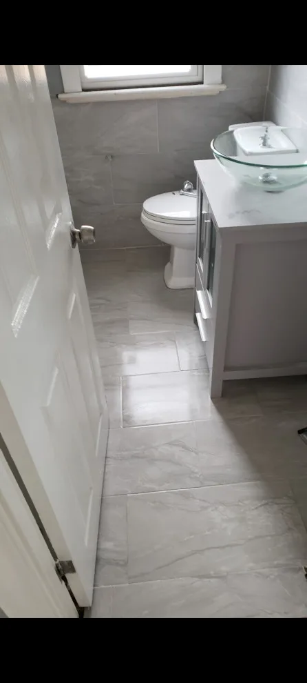 Restroom Renovation by Construction One - Photo 12