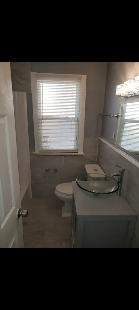 Restroom Renovation by Construction One - Photo 21