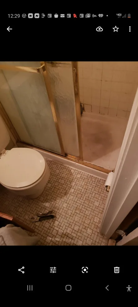 Restroom Renovation by Construction One - Photo 16