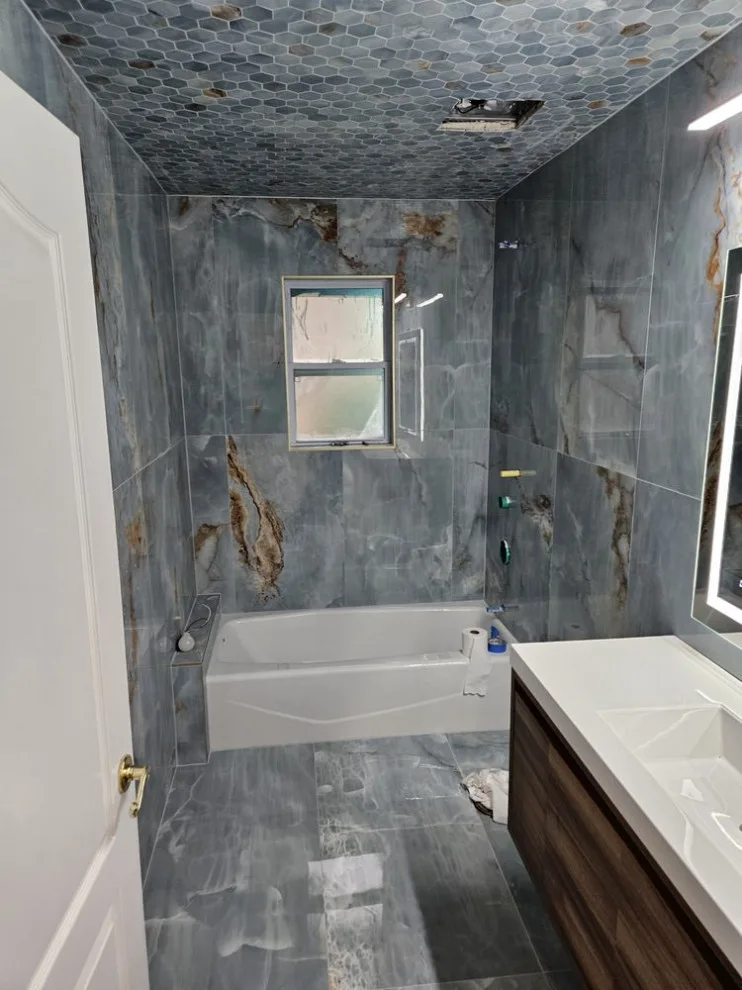 Restrooms by Revolution Construction Inc. - Photo 17