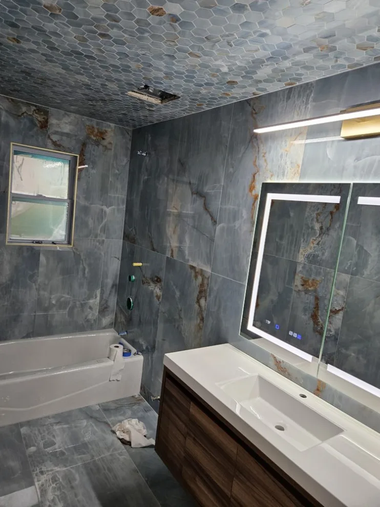 Restrooms by Revolution Construction Inc. - Photo 21