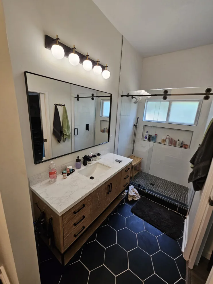 Restrooms by Revolution Construction Inc. - Photo 15