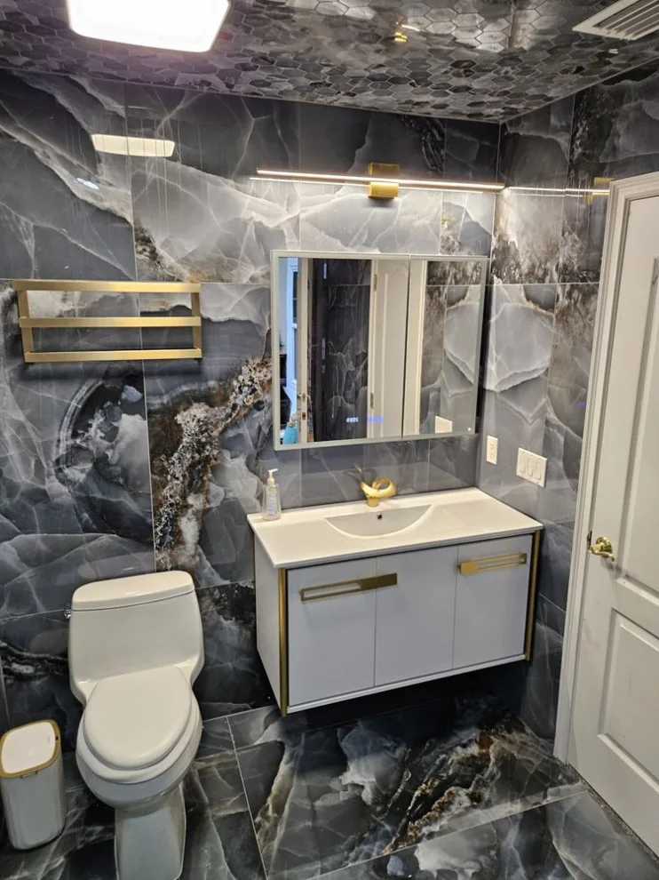 Restrooms by Revolution Construction Inc. - Photo 7