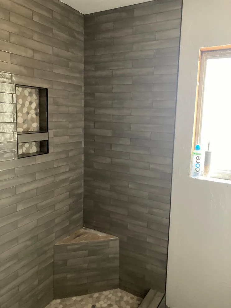 Natural Stone and Grey Subway Tile Bathroom by Lake Tahoe Construction Services, INC. - Photo 2