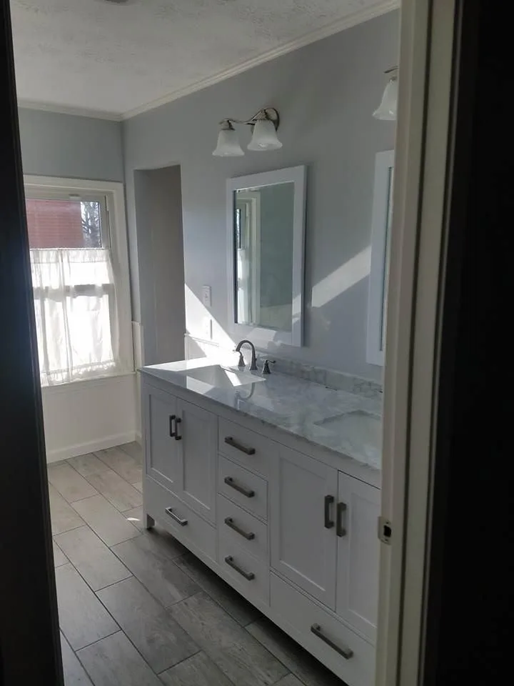 Restroom renovation by S & T Remodeling - Photo 23