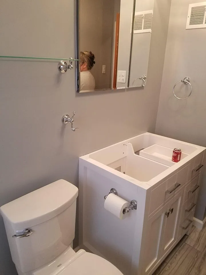 Restroom renovation by S & T Remodeling - Photo 13