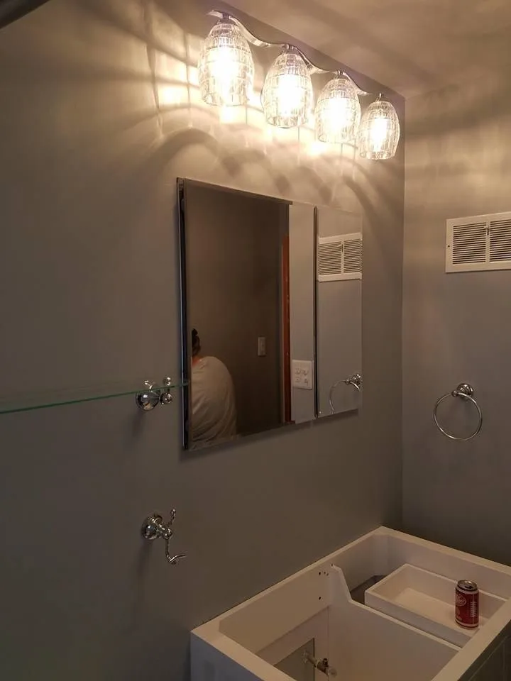 Restroom renovation by S & T Remodeling - Photo 19