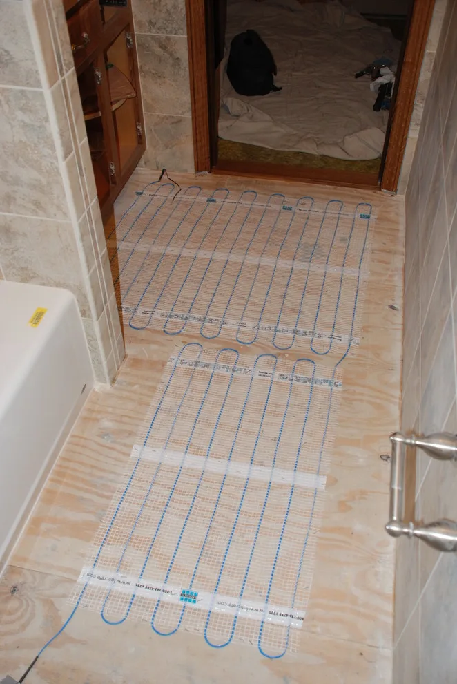 Restroom renovation by Triangle Cabinet & Specialty Company - Photo 7