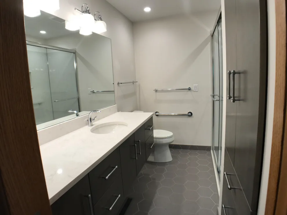 Floating Vanity Bathroom Renovation with Onyx Shower and Additional Features by D & L Construction - Photo 2