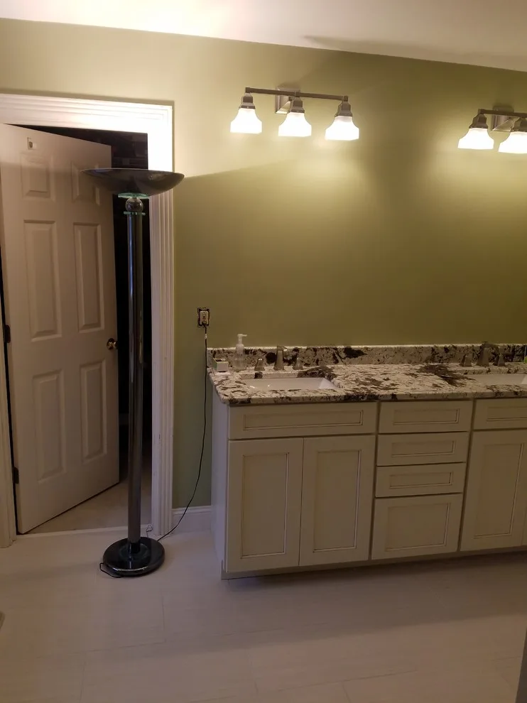 Bathroom renovation by S & T Remodeling - Photo 10