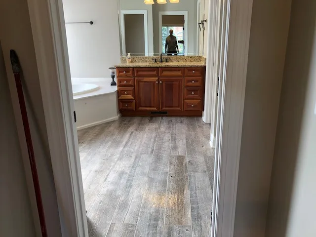 Restroom Tile Upgrade by Rainwater Builders - Photo 5