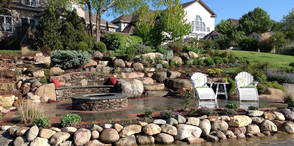 Bluestone and Brick Paving with Boulder Walls by Hively Landscaping Inc. - Photo 5