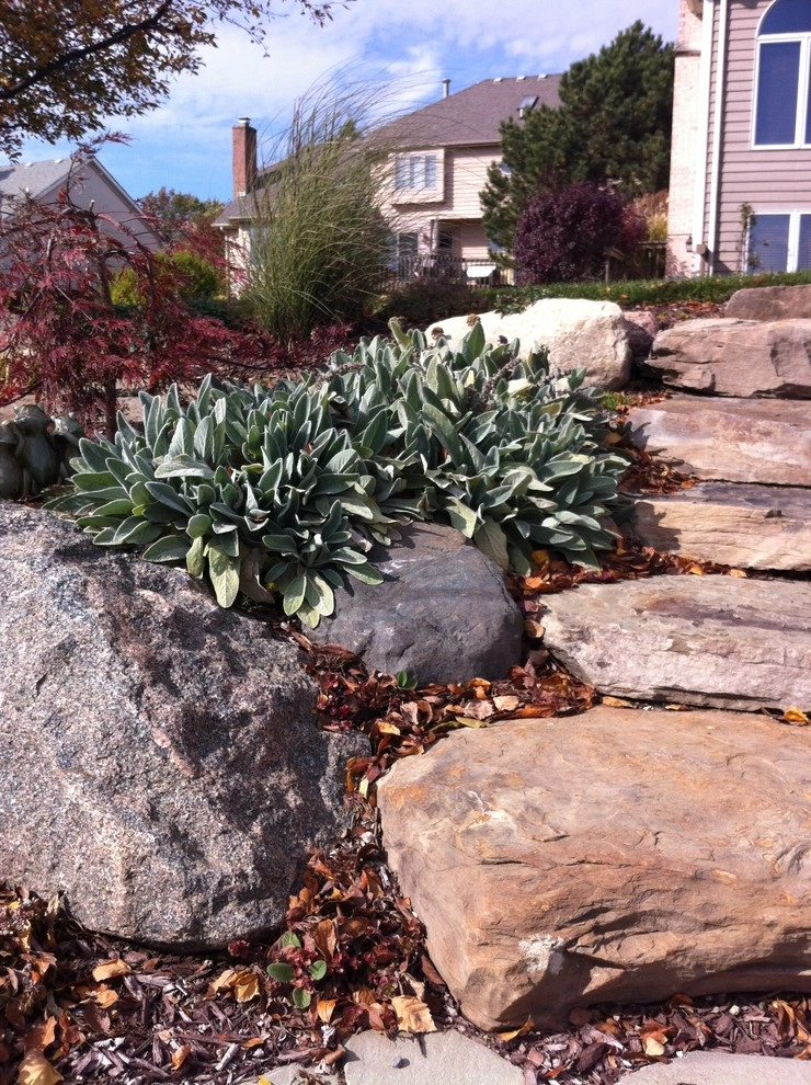 Bluestone and Brick Paving with Boulder Walls by Hively Landscaping Inc. - Photo 4