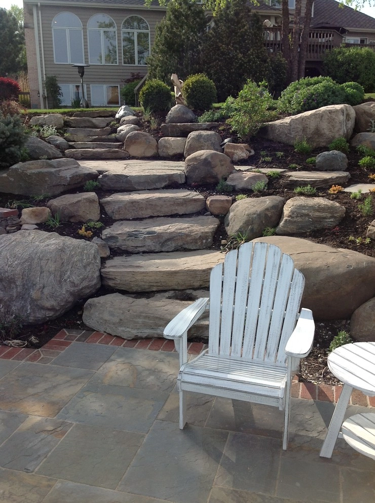 Bluestone and Brick Paving with Boulder Walls by Hively Landscaping Inc. - Photo 10