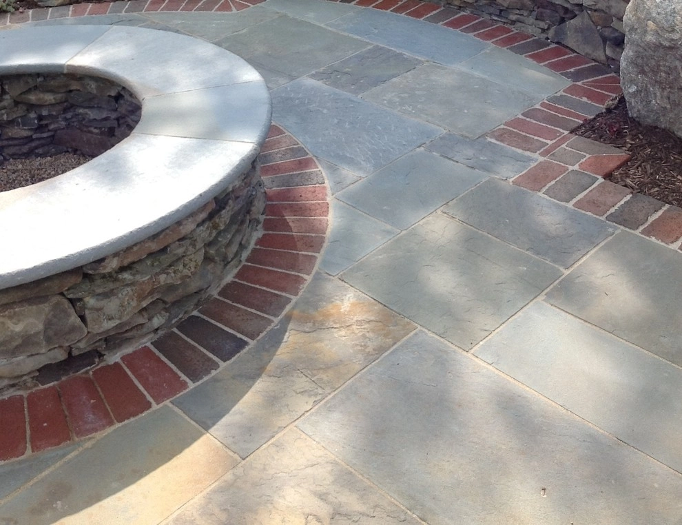 Bluestone and Brick Paving with Boulder Walls by Hively Landscaping Inc. - Photo 2