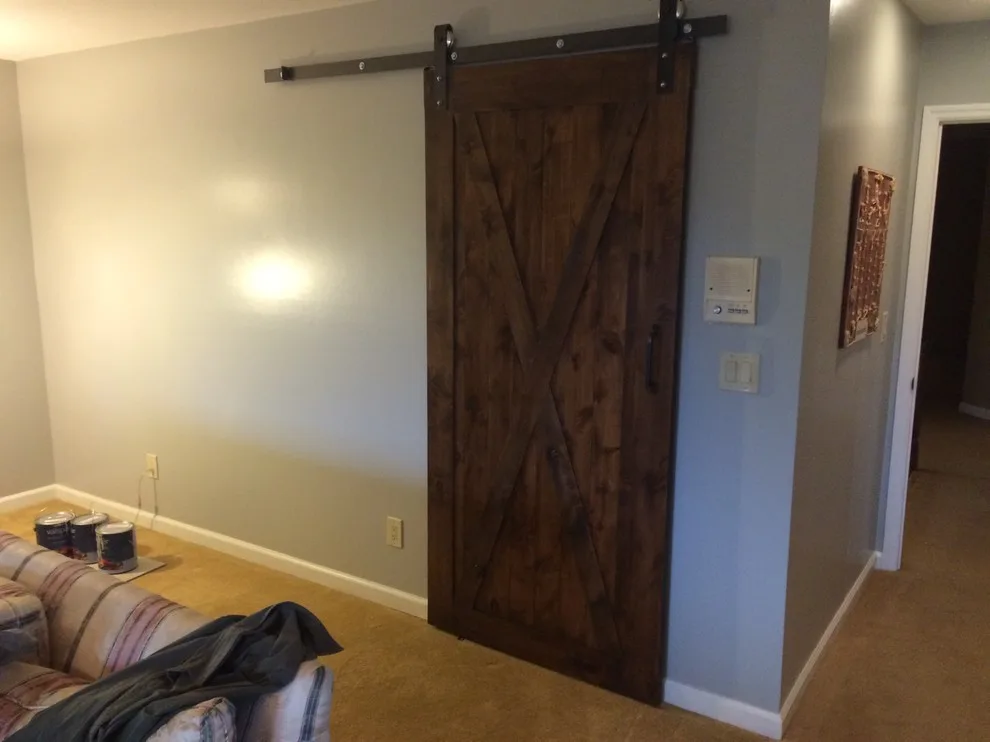 Bathroom featuring a sliding barn door by Embark Project Services, LLC - Photo 28