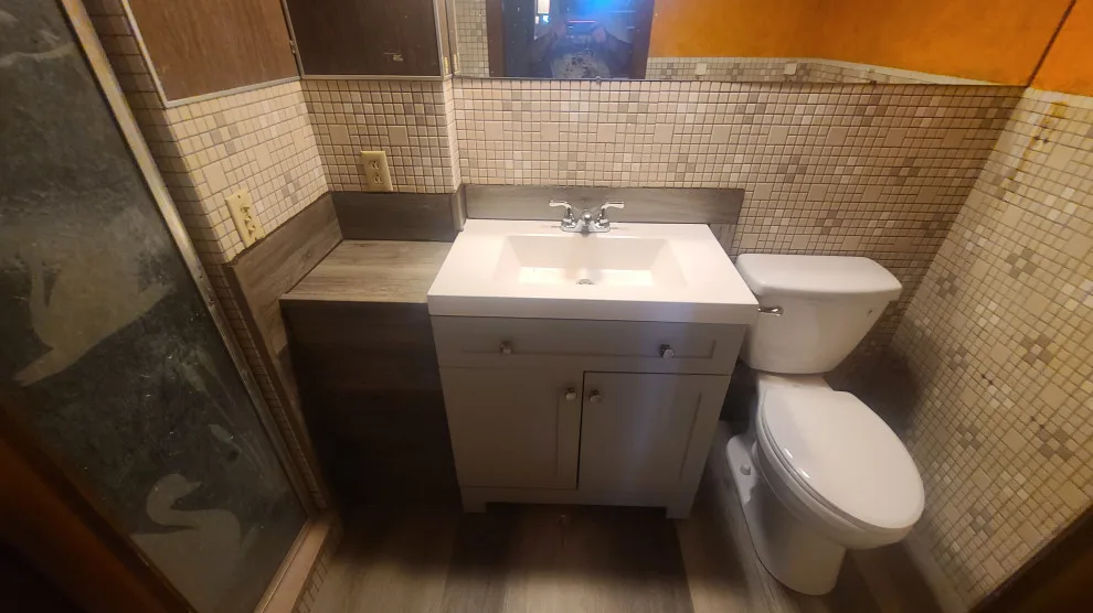 Restrooms by Ampol Home Improvement - Photo 22