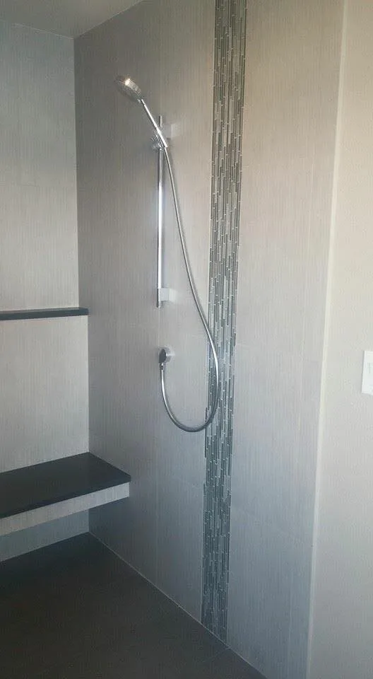Restrooms by Craftsman Construction - Photo 5