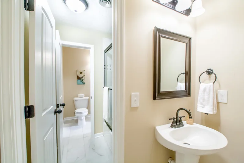 Restrooms by Down Home Renovations - Photo 26