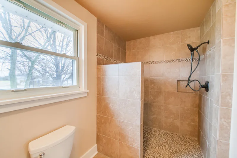 Restrooms by Down Home Renovations - Photo 25