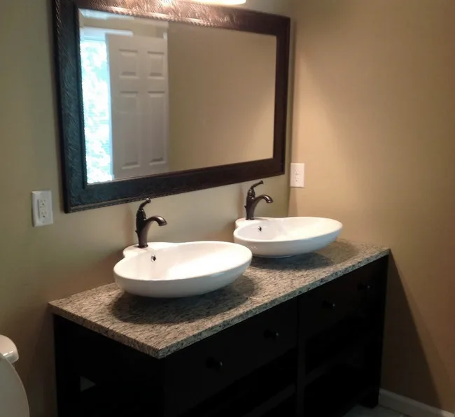Restrooms by Down Home Renovations - Photo 30