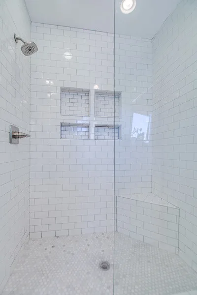 Restrooms by Down Home Renovations - Photo 19