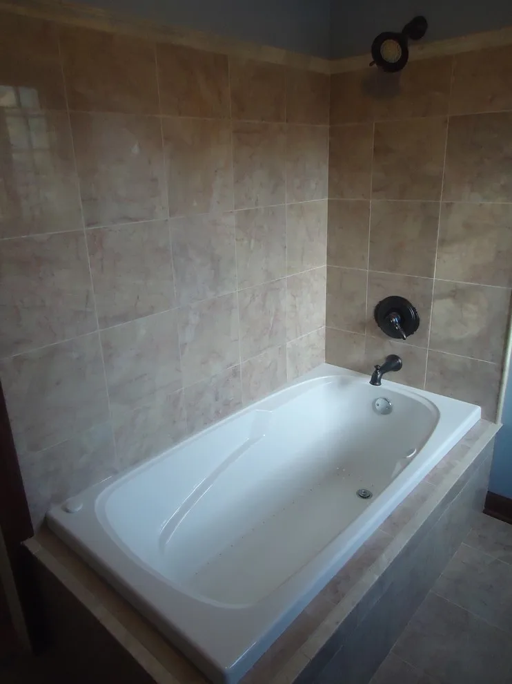 Restrooms by Veritas Custom Homes - Photo 10