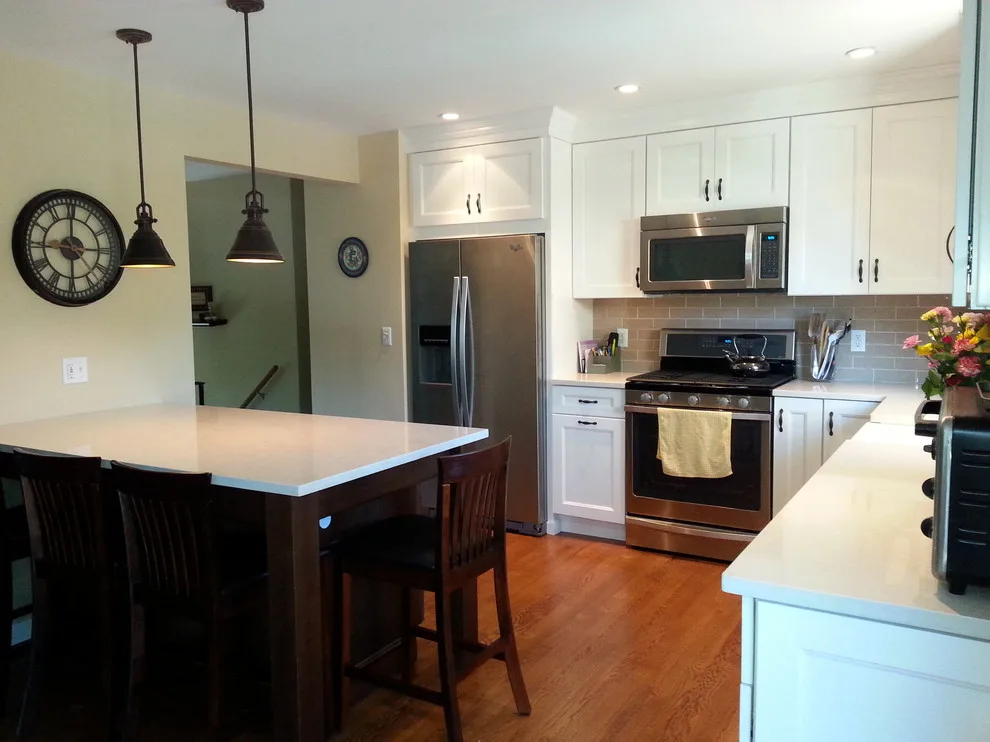 Elegant Two-Level Kitchen by Heinold Home Improvement LLC - Photo 2