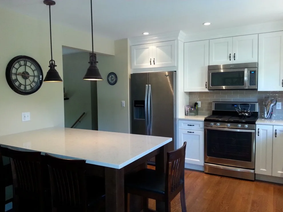 Elegant Two-Level Kitchen by Heinold Home Improvement LLC - Photo 4