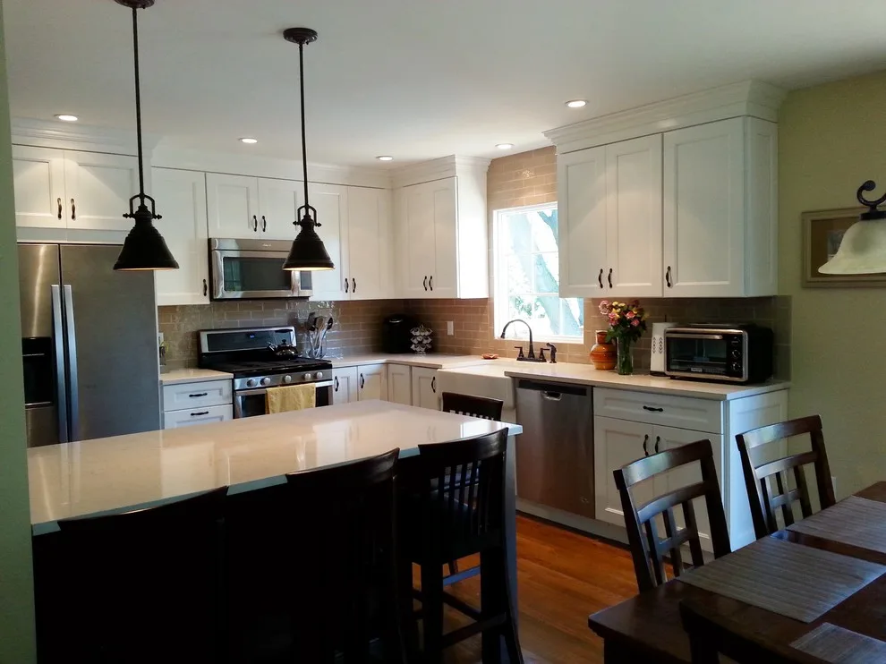 Elegant Two-Level Kitchen by Heinold Home Improvement LLC - Photo 6