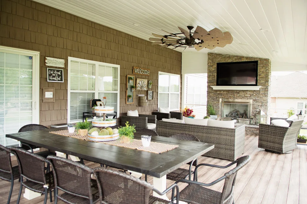 Stunning Exterior Transformation with Spacious Covered Deck and Fireplace by Cooper Construction And Restoration, Inc. - Photo 18