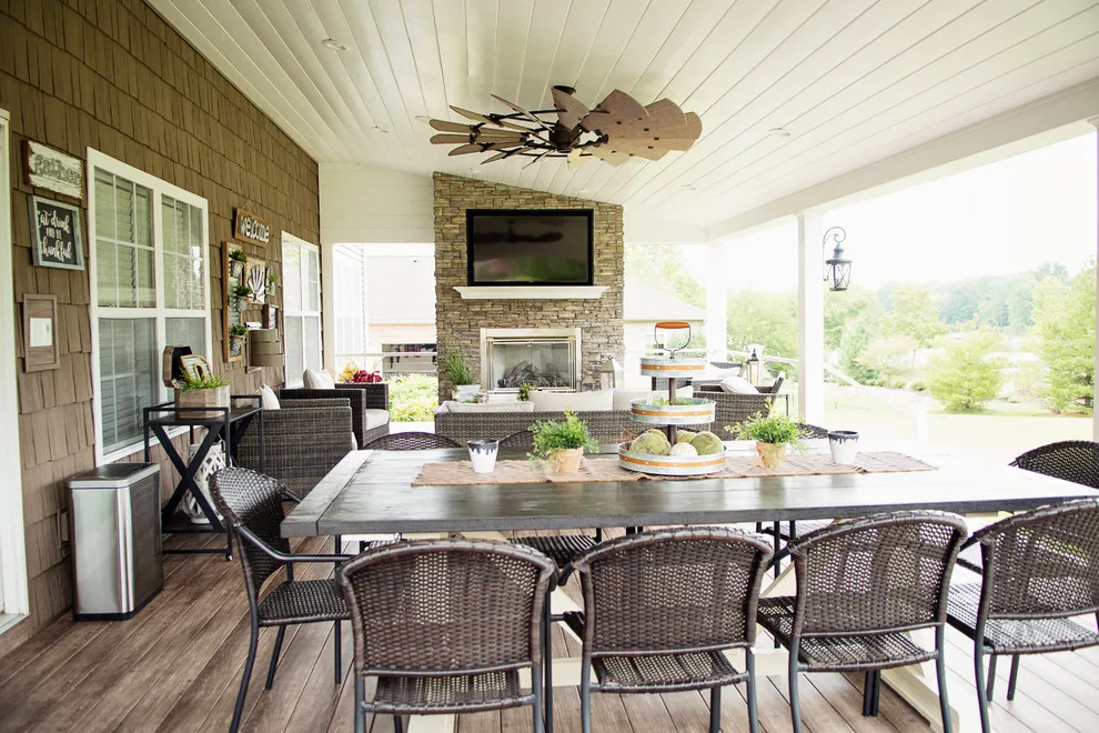 Stunning Exterior Transformation with Spacious Covered Deck and Fireplace by Cooper Construction And Restoration, Inc. - Photo 6