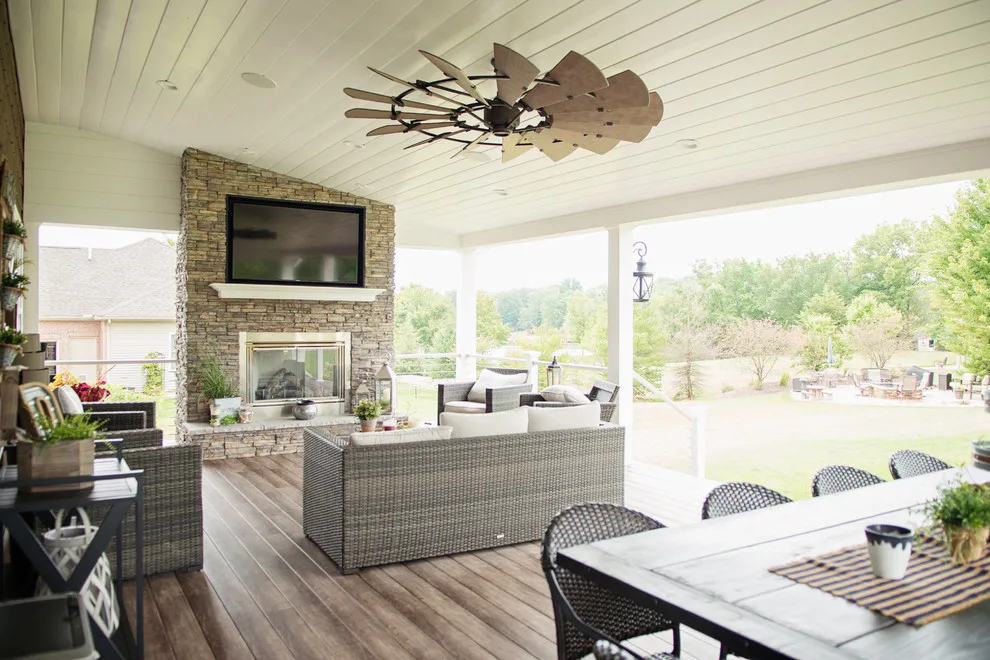 Stunning Exterior Transformation with Spacious Covered Deck and Fireplace by Cooper Construction And Restoration, Inc. - Photo 10