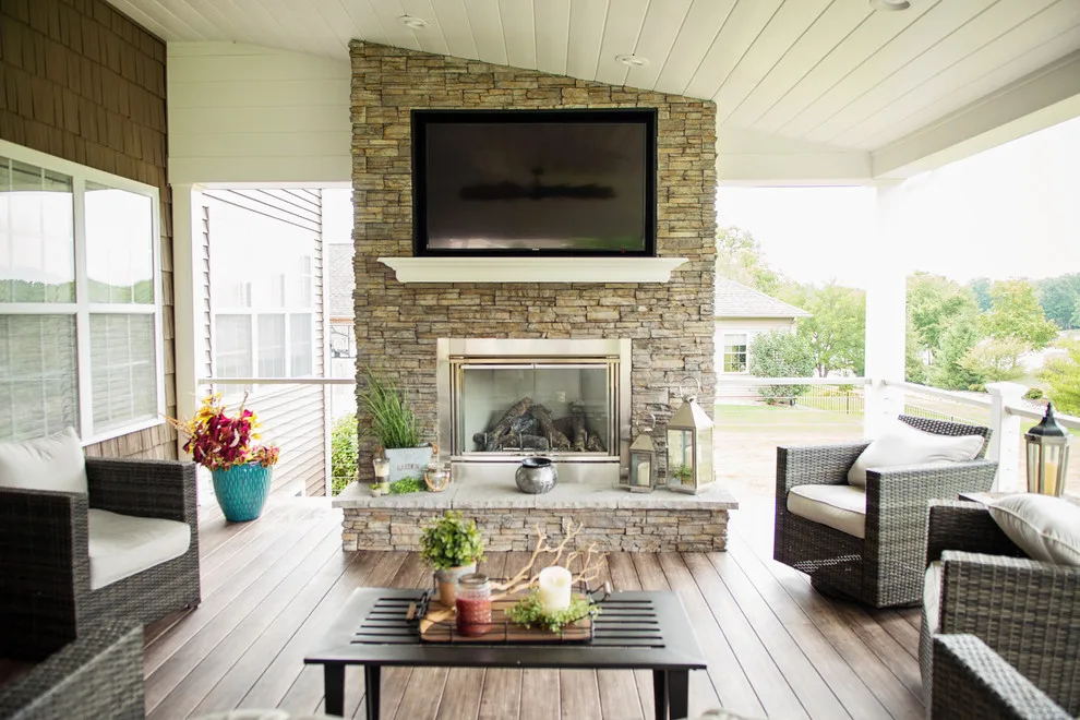 Stunning Exterior Transformation with Spacious Covered Deck and Fireplace by Cooper Construction And Restoration, Inc. - Photo 9