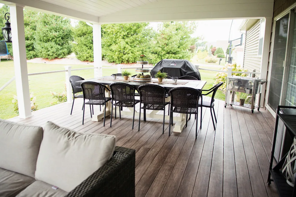 Stunning Exterior Transformation with Spacious Covered Deck and Fireplace by Cooper Construction And Restoration, Inc. - Photo 2
