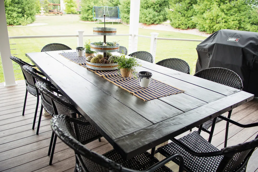 Stunning Exterior Transformation with Spacious Covered Deck and Fireplace by Cooper Construction And Restoration, Inc. - Photo 14