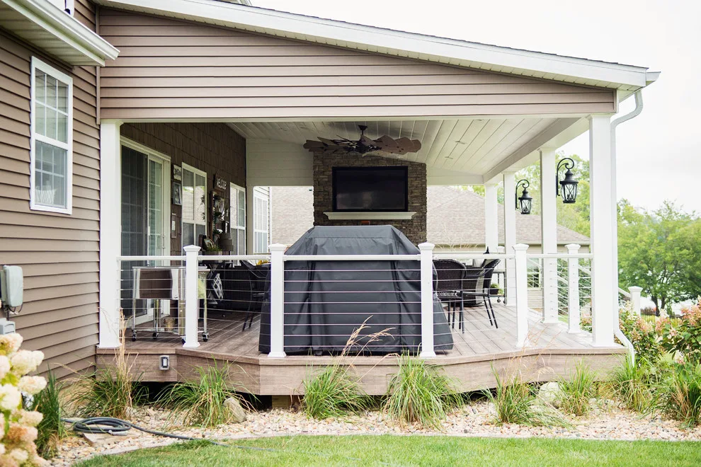 Stunning Exterior Transformation with Spacious Covered Deck and Fireplace by Cooper Construction And Restoration, Inc. - Photo 3