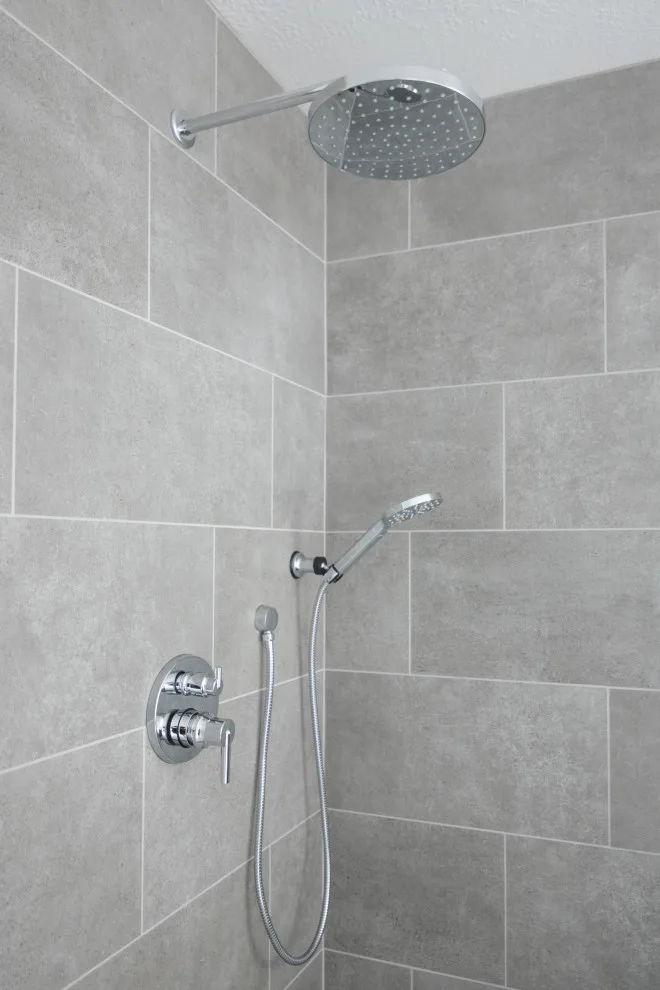 Stunning Blue Pebble Creek Bathroom Makeover by Buck The Builder - Photo 24