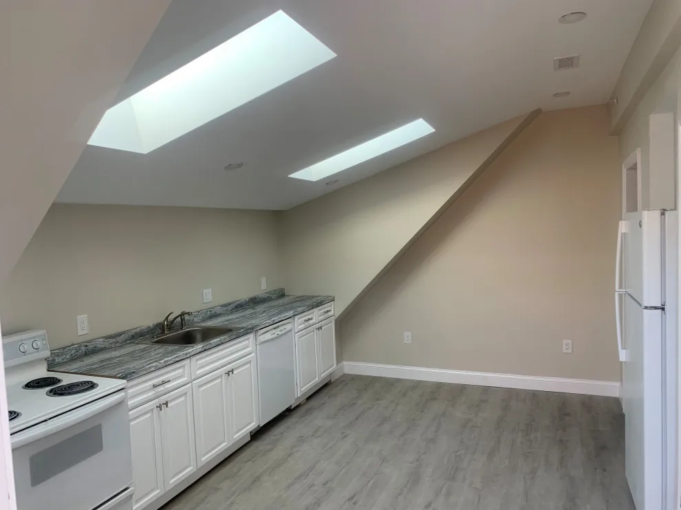 Stunning Kitchen Renovation by New England Construction And Properties, LLC - Photo 26