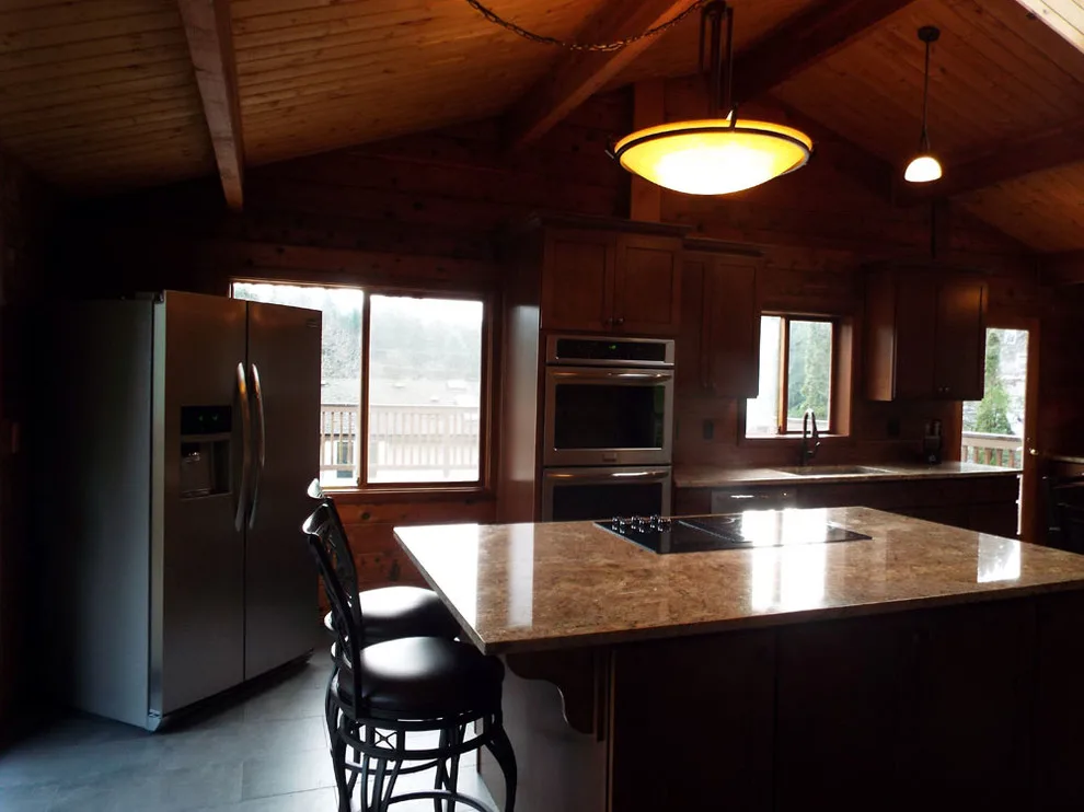 Charming Renovation of a Log Cabin Kitchen by Gesang Remodeling - Photo 5