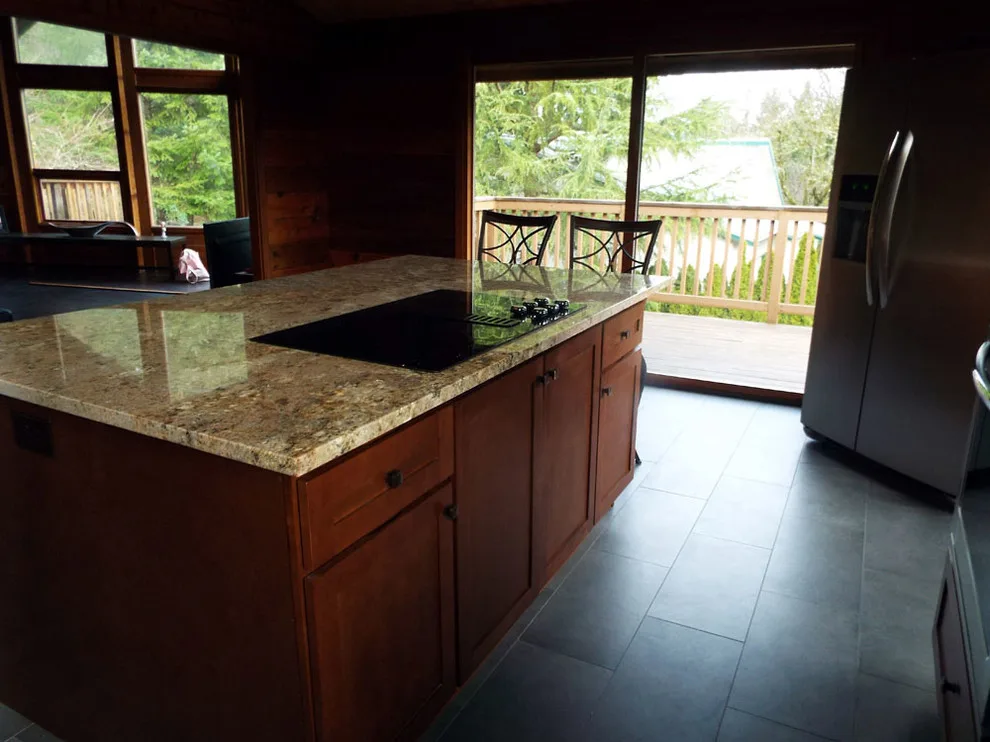 Charming Renovation of a Log Cabin Kitchen by Gesang Remodeling - Photo 2