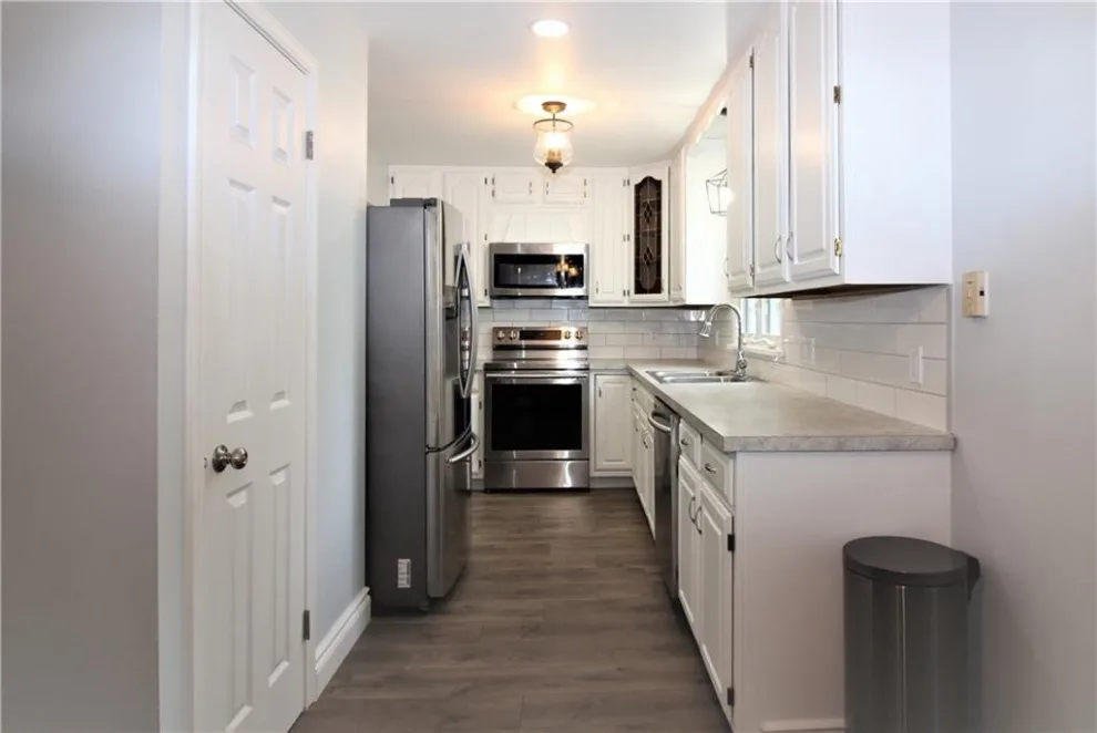 Stunning Rochester Cape Cod Makeover by Arsenal Construction | Custom Builds & Renovations - Photo 7