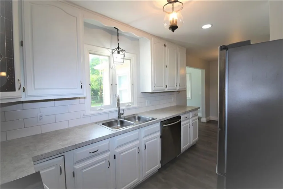 Stunning Rochester Cape Cod Makeover by Arsenal Construction | Custom Builds & Renovations - Photo 15