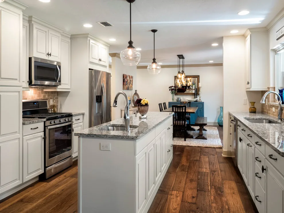 Modern Galley Kitchen Transformation by Robinson Renovation & Custom Homes, Inc. - Photo 4