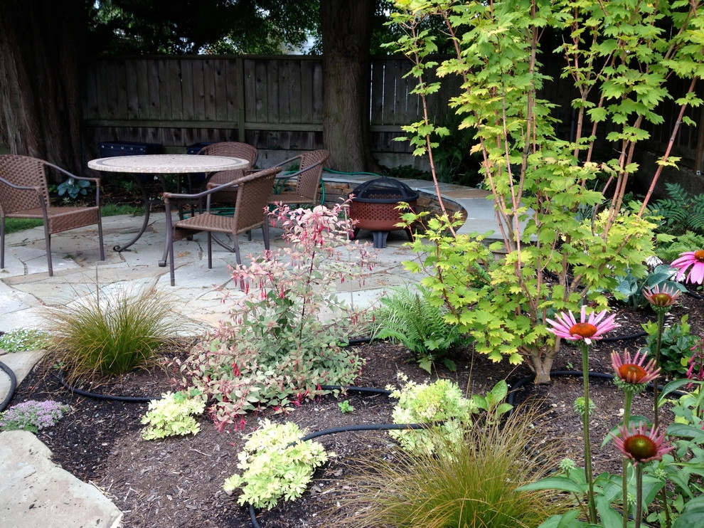 Phinney Ridge Circular Bluestone and Seating Wall by In Harmony Sustainable Landscapes - Photo 2