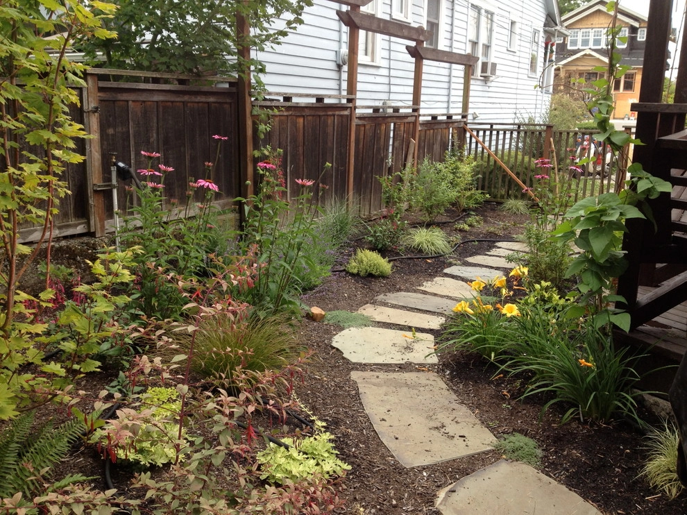 Phinney Ridge Circular Bluestone and Seating Wall by In Harmony Sustainable Landscapes - Photo 5