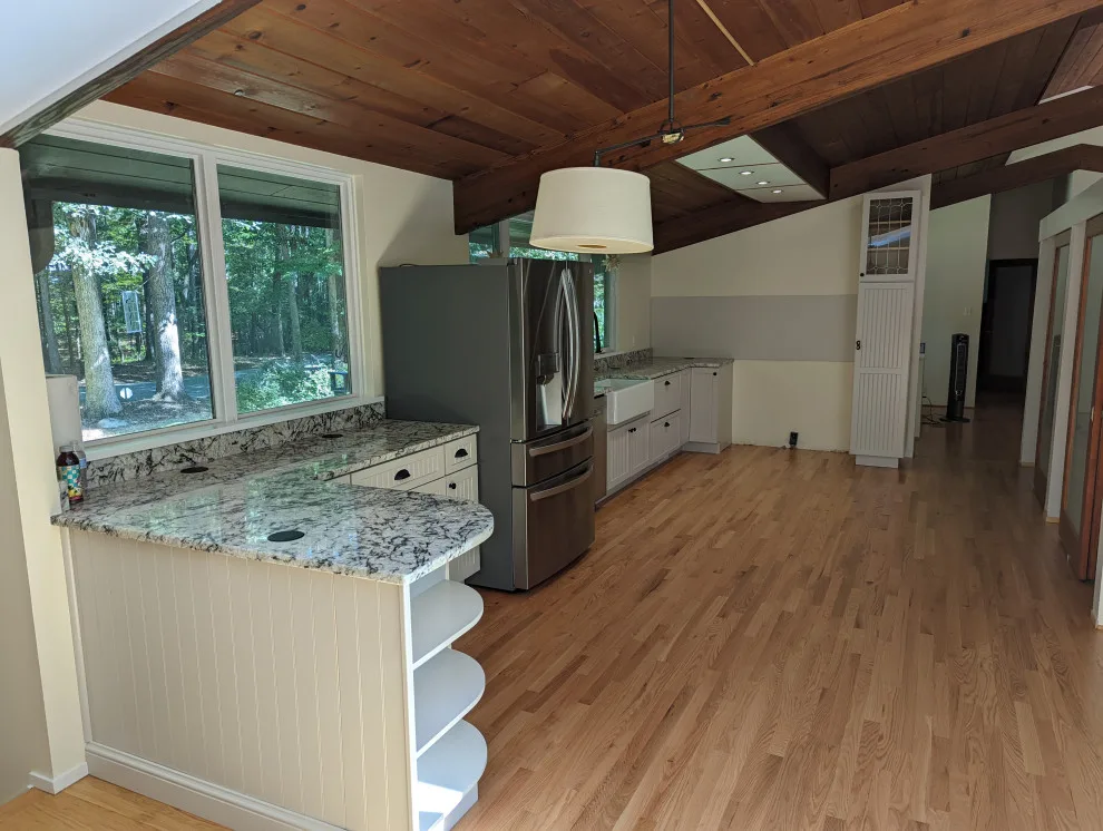 Open concept kitchen by A.M.Carter Construction Inc - Photo 3