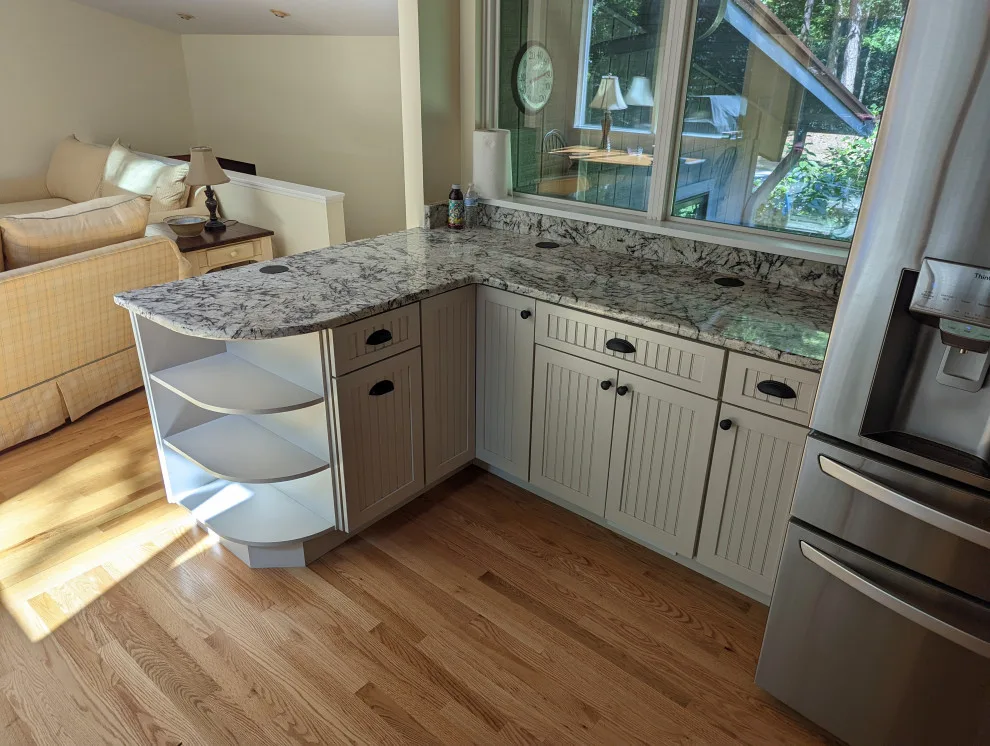 Open concept kitchen by A.M.Carter Construction Inc - Photo 9