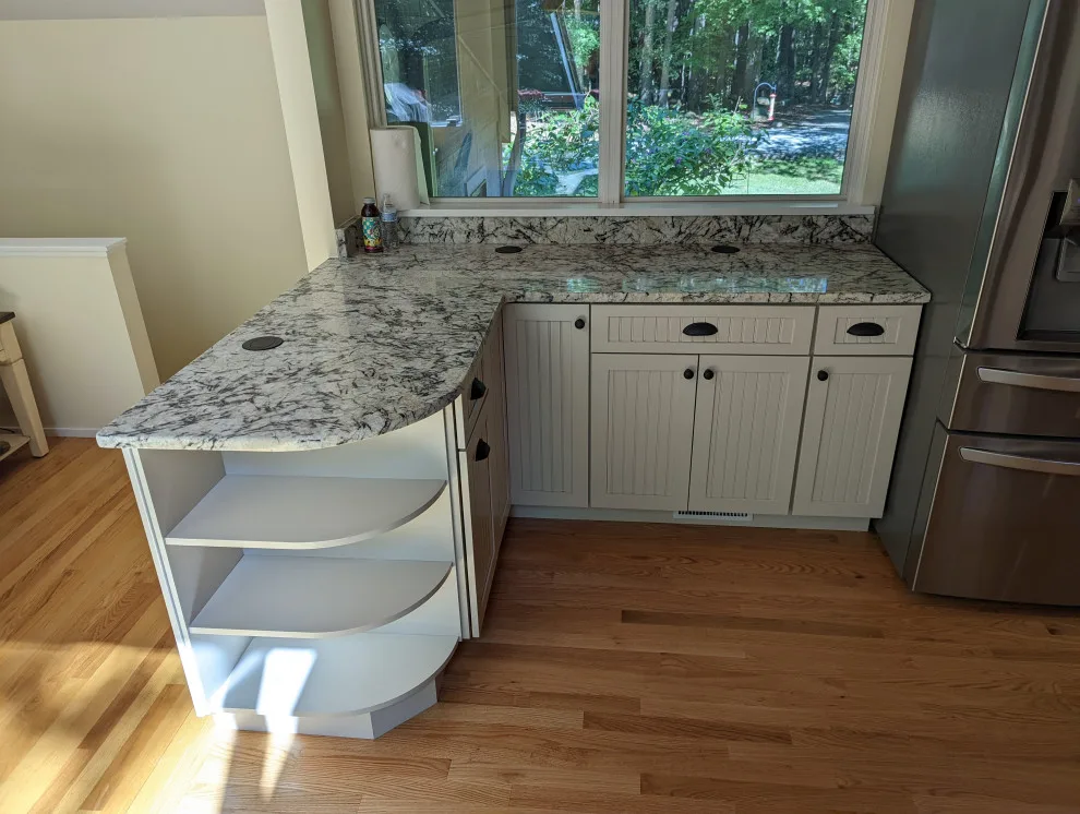 Open concept kitchen by A.M.Carter Construction Inc - Photo 10