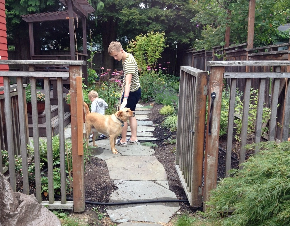 Phinney Ridge Circular Bluestone and Seating Wall by In Harmony Sustainable Landscapes - Photo 4